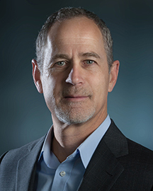 headshot of board nominee Michael Powell
